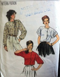 8306 VOGUE SHORT FLARE  TIER-LONG SLV BLOUSE PATTERN 12